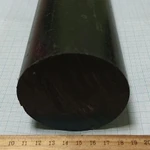фото Капролон графитонаполненный стержень Ф 80 мм ПА-6 МГ (1000 мм, 6,3 кг) экстр.