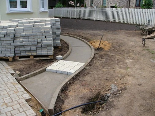 Фото Укладка тротуарной плитки
