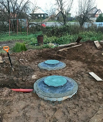 Фото Установка септиков из бетонных колец