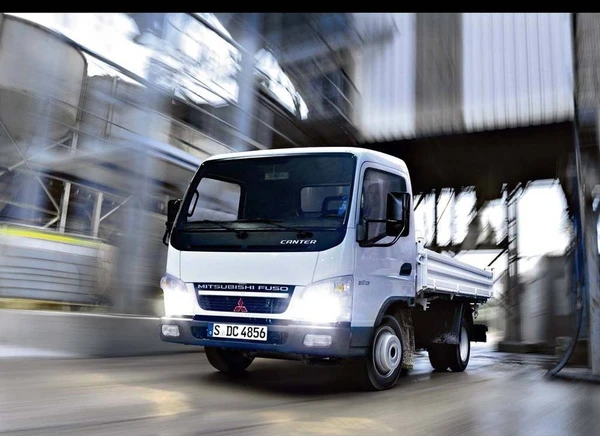 Фото Бортовой грузовик Mitsubishi Canter 2014 г. в. г/п 5 т