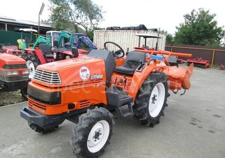 Фото Японский трактор Kubota X20D