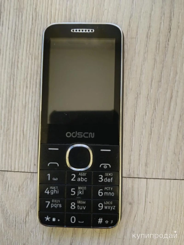 Фото Кнопочный телефон.