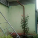 Отштукатурить стены фасада частного дома. 
