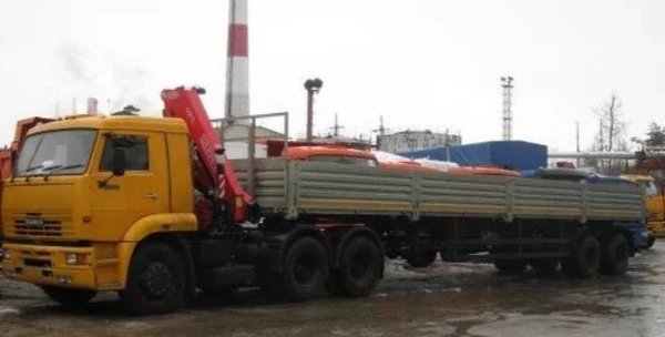 Фото Услуги манипулятора от 10-25т