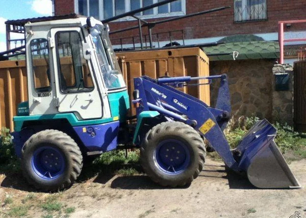 Фото Японский фронтальный погрузчик Komatsu WA 40