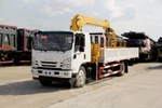 фото Бортовой автомобиль на шасси Isuzu Elf 4х2, 190 л.с, борт 6 м, с КМУ 5 т