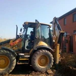 Услуги экскаватора-погрузчика CAT434F