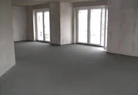Фото Полусухая механизированная стяжка пола