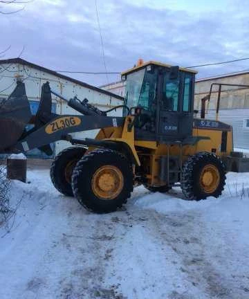 Фото Услуги фронтального погрузчика