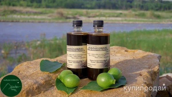 Фото Сок грецкого ореха молочной спелости